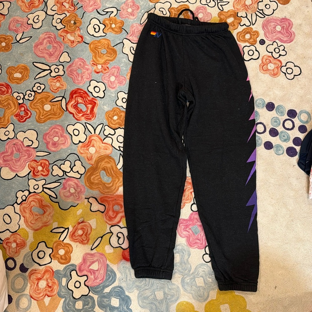 Size extra small black with purple and pink lightning bolt aviation sweatpants